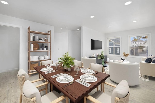 dining area with light hardwood / wood-style flooring