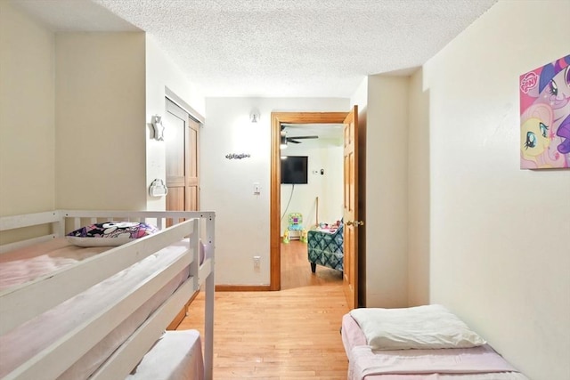 47 N Summer St, Holyoke, MA 01040 - hall featuring light wood finished floors and a textured ceiling