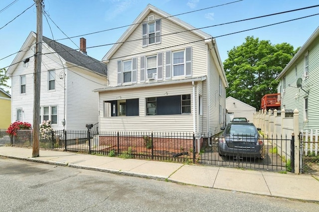 47 N Summer St, Holyoke, MA 01040 - view of front facade featuring a fenced front yard