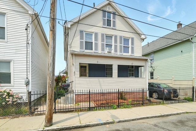 47 N Summer St, Holyoke, MA 01040 - view of front facade with a porch and a fenced front yard