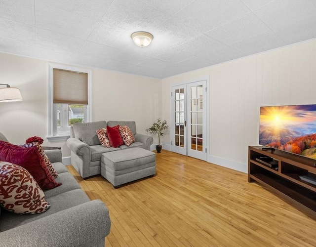 71 Dudley St, Marlborough, MA 01752 - living room with hardwood / wood-style flooring, french doors, and baseboards