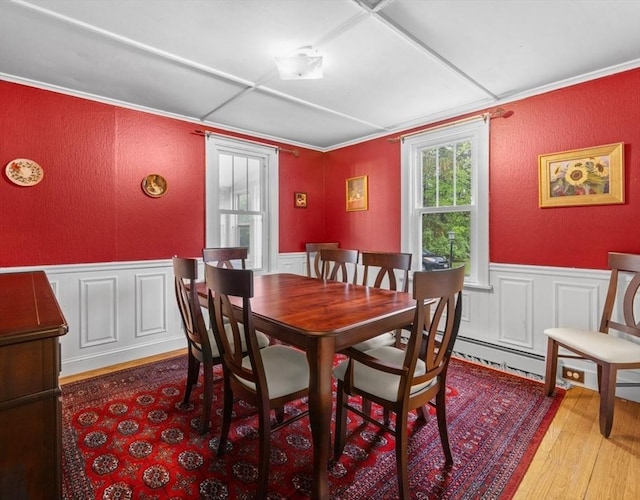71 Dudley St, Marlborough, MA 01752 - dining space featuring wood finished floors, wainscoting, a decorative wall, and a textured wall