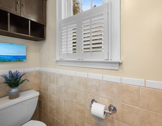 71 Dudley St, Marlborough, MA 01752 - half bath with toilet, wainscoting, and tile walls