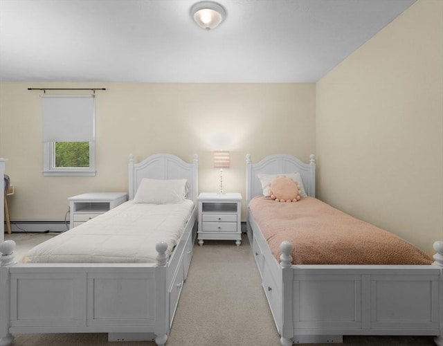 71 Dudley St, Marlborough, MA 01752 - bedroom with baseboard heating and light colored carpet