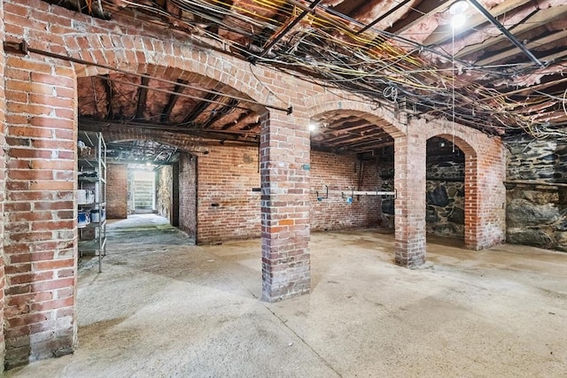 interior space with brick wall