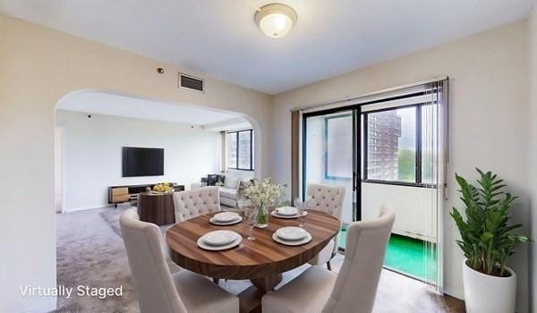 250 Hammond Pond Pkwy Unit 707S, Newton, MA 02467 - dining area featuring arched walkways
