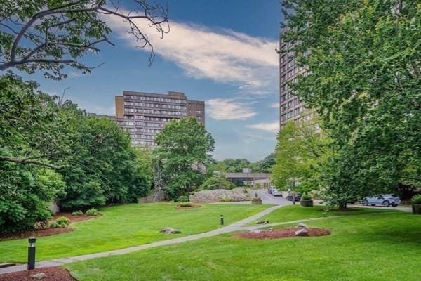 250 Hammond Pond Pkwy Unit 707S, Newton, MA 02467 - view of property's community with a yard