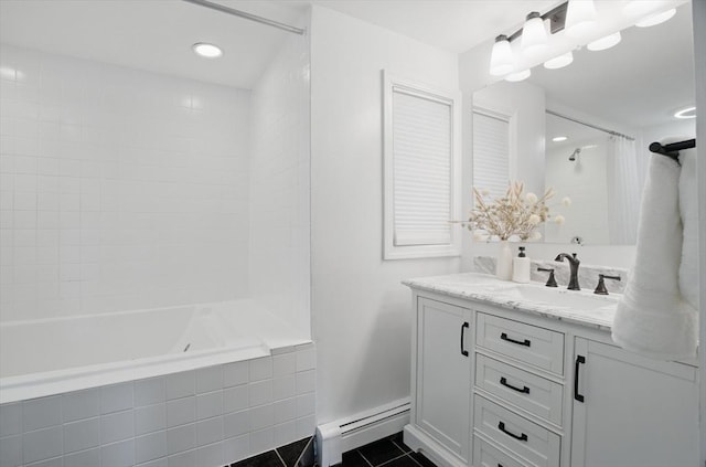bathroom featuring baseboard heating, tile patterned floors, vanity, and recessed lighting