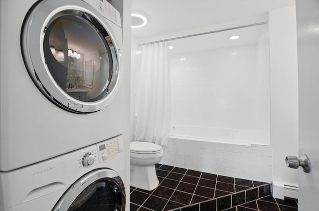 bathroom with stacked washer and clothes dryer, tile patterned flooring, a baseboard heating unit, toilet, and shower / bath combination with curtain