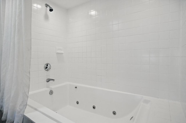 bathroom featuring a combined bath / shower with jetted tub