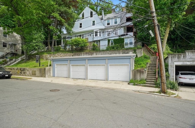 view of front of home with stairway