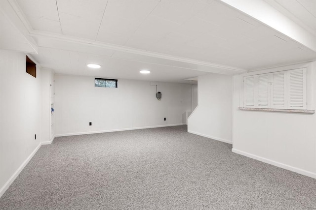 below grade area featuring carpet, recessed lighting, and baseboards