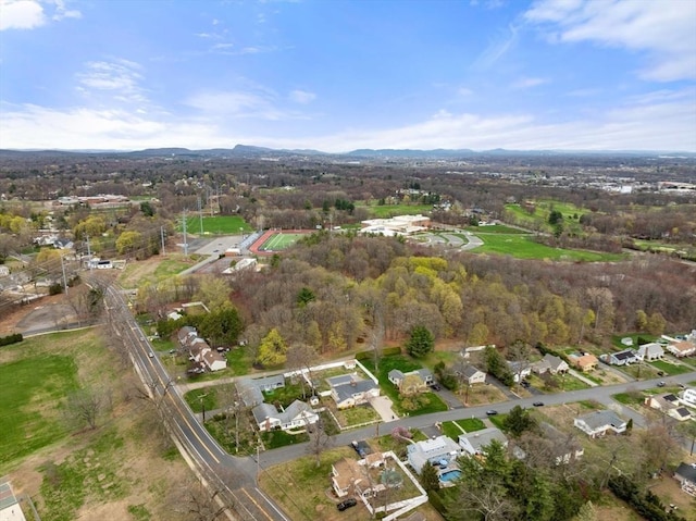 birds eye view of property featuring a mountain view and a residential view