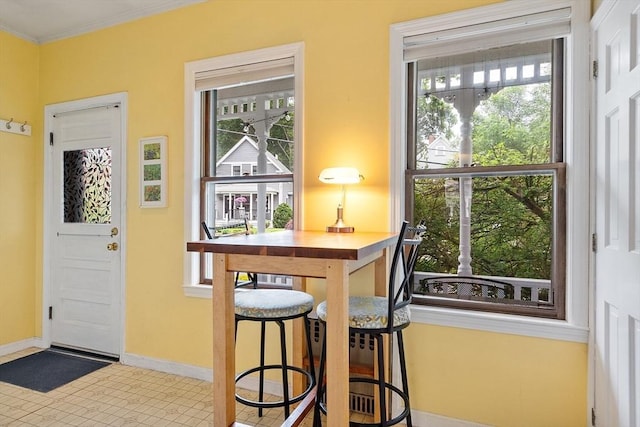 102 Chestnut St, Andover, MA 01810 - dining space with baseboards and crown molding