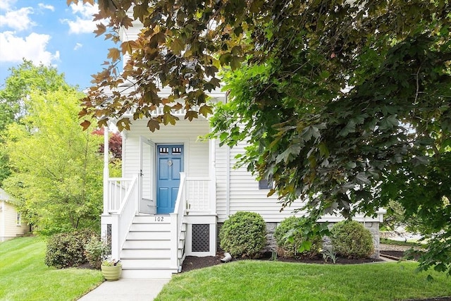102 Chestnut St, Andover, MA 01810 - view of front of property with a front lawn