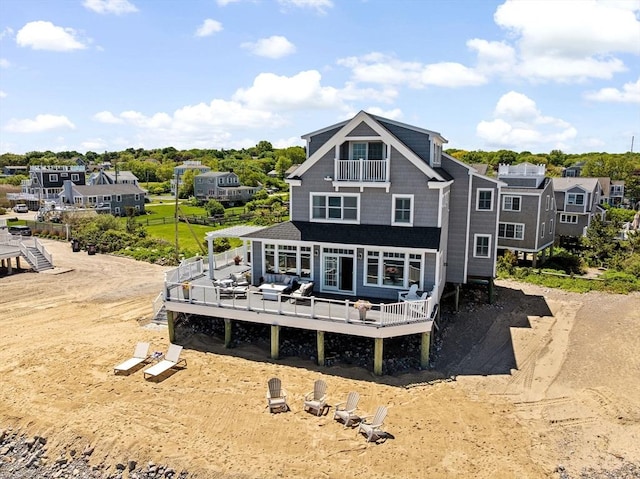 55 Seaside Rd, Scituate, MA 02066 - rear view of property featuring a deck