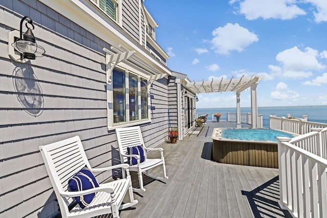 55 Seaside Rd, Scituate, MA 02066 - deck with a pergola, a hot tub, and a water view