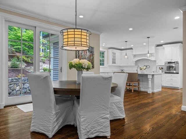 50 Temple Rd, Wellesley, MA 02482 - dining area with crown molding, recessed lighting, and dark wood-type flooring