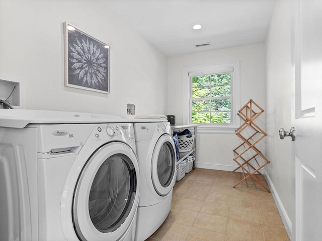 50 Temple Rd, Wellesley, MA 02482 - laundry area with washing machine and dryer, baseboards, and light tile patterned floors
