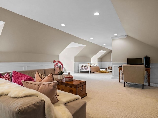 50 Temple Rd, Wellesley, MA 02482 - carpeted living room featuring lofted ceiling, wainscoting, recessed lighting, and a decorative wall