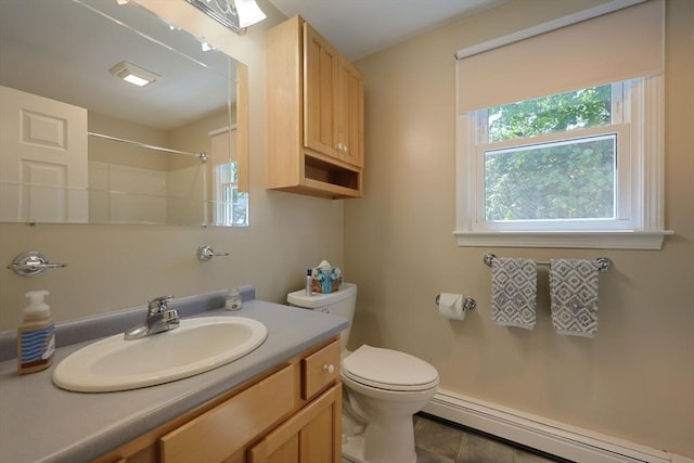 full bath with a baseboard heating unit, toilet, vanity, tile patterned floors, and a shower