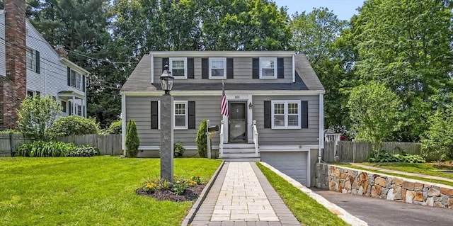 101 Eastern Ave, Woburn, MA 01801 - view of front of property with driveway, a garage, and roof with shingles