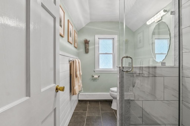 101 Eastern Ave, Woburn, MA 01801 - full bath with vaulted ceiling, a baseboard heating unit, a stall shower, and tile patterned flooring