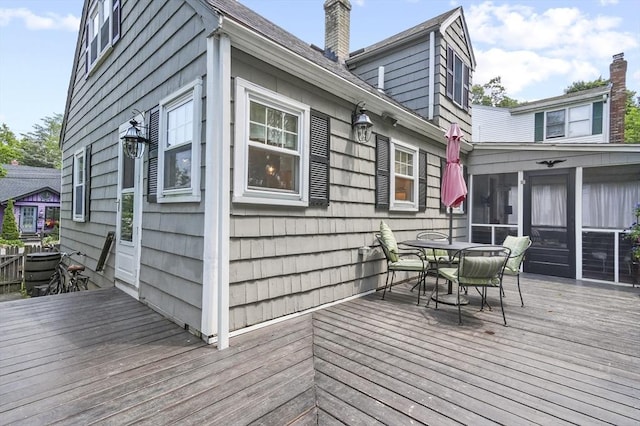 101 Eastern Ave, Woburn, MA 01801 - deck featuring outdoor dining space and a sunroom