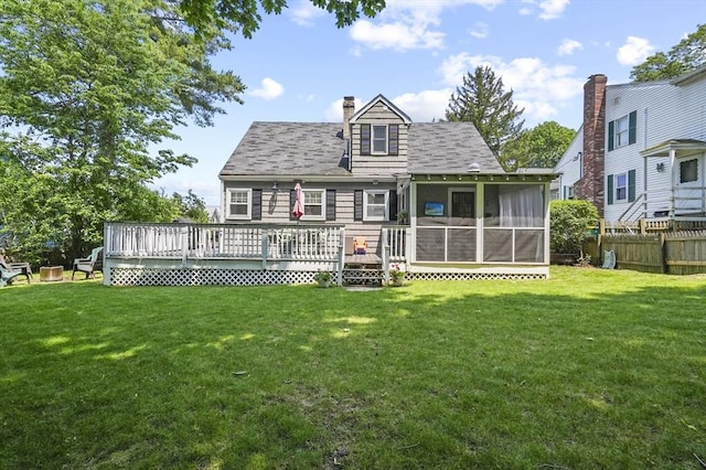 101 Eastern Ave, Woburn, MA 01801 - back of house with a sunroom, a deck, a chimney, and a shingled roof