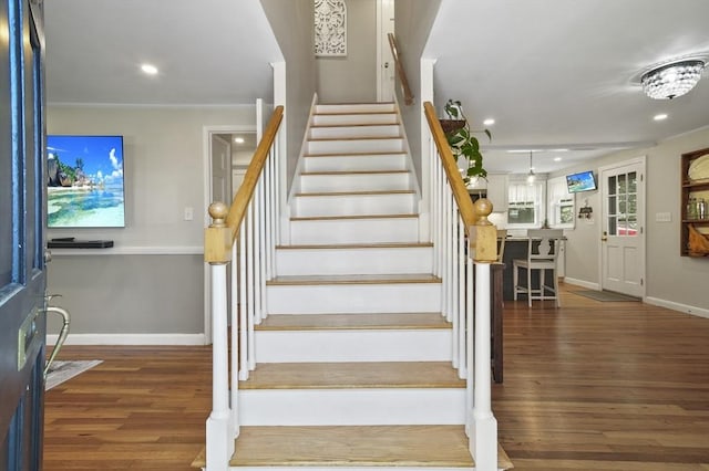 101 Eastern Ave, Woburn, MA 01801 - stairway with wood finished floors, recessed lighting, and crown molding