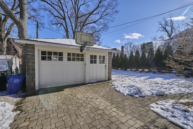 view of snow covered garage