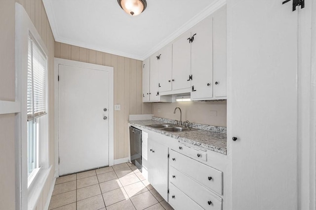 kitchen with ornamental molding, a sink, light countertops, white cabinets, and dishwasher