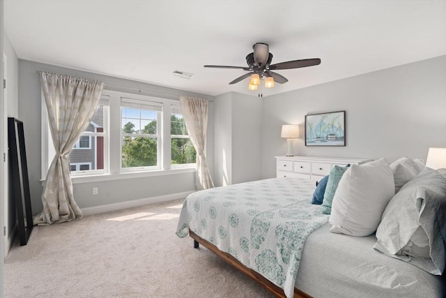 51 Waltham St Unit 3, Maynard, MA 01754 - bedroom with baseboards, light colored carpet, and ceiling fan