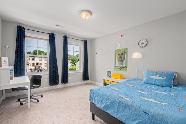 51 Waltham St Unit 3, Maynard, MA 01754 - bedroom with carpet flooring, a desk, and baseboards