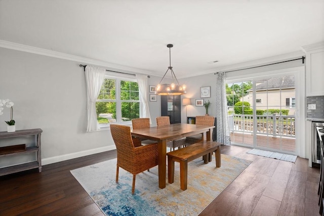 51 Waltham St Unit 3, Maynard, MA 01754 - dining space featuring a chandelier, ornamental molding, dark wood-style flooring, and baseboards