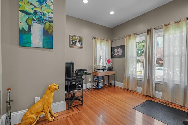 office with recessed lighting, baseboards, and wood finished floors