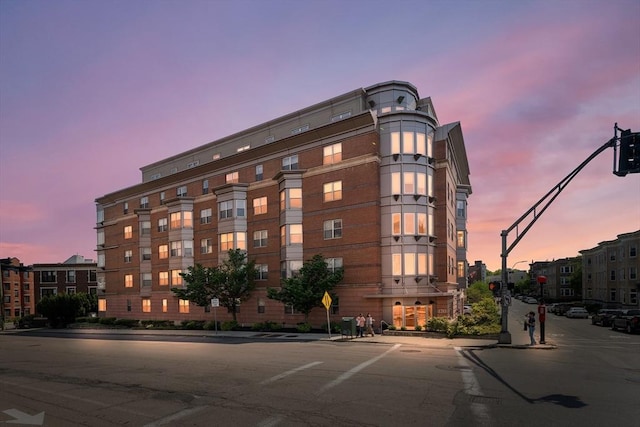 view of property at dusk