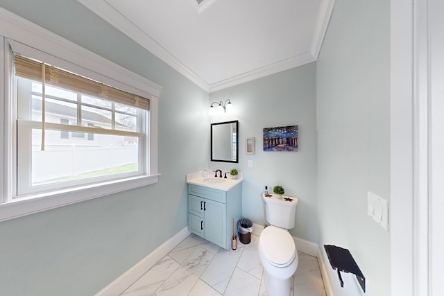 bathroom featuring ornamental molding, toilet, tile floors, and vanity