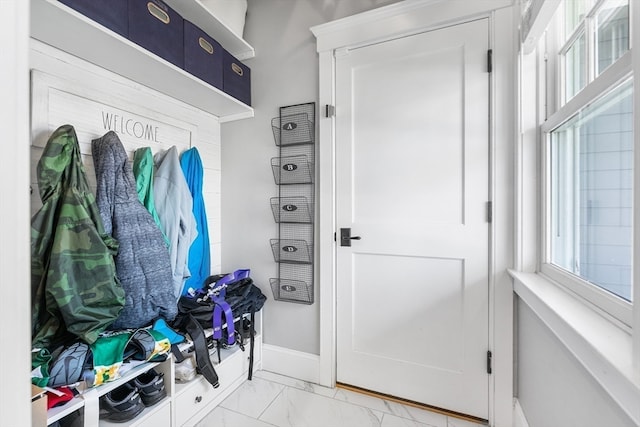 mudroom with light tile floors