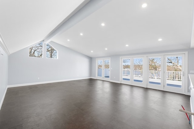 interior space with a healthy amount of sunlight and vaulted ceiling with beams