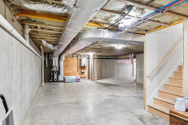 basement with heating utilities and gas water heater