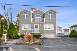 view of front of home with a balcony