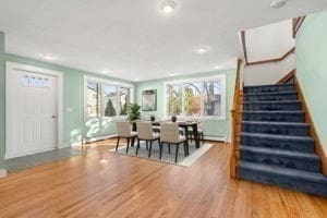 dining area with wood-type flooring