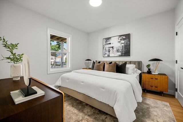 bedroom featuring hardwood / wood-style flooring