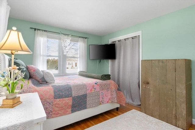 bedroom featuring hardwood / wood-style floors