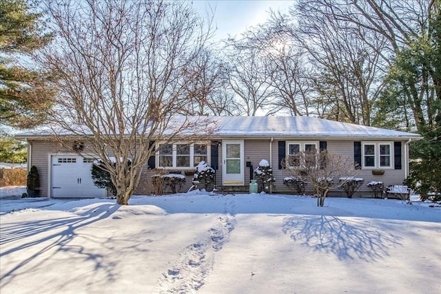 single story home with a garage