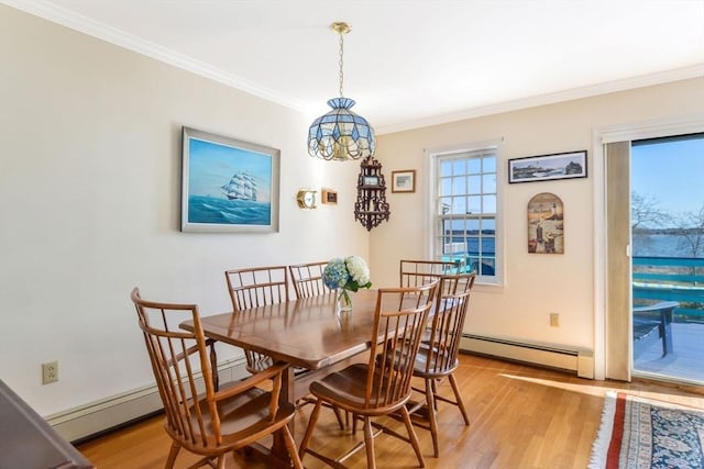 12 Taunton Ave, Marion, MA 02738 - dining area with a baseboard radiator, light wood-style flooring, crown molding, and a chandelier