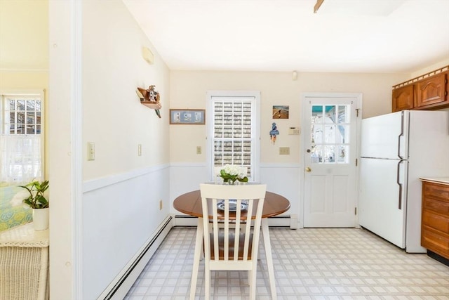 12 Taunton Ave, Marion, MA 02738 - dining area with light floors and baseboard heating