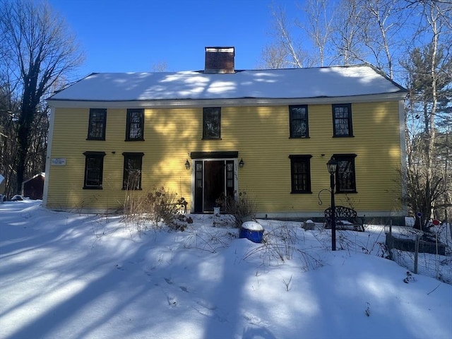 view of snow covered property