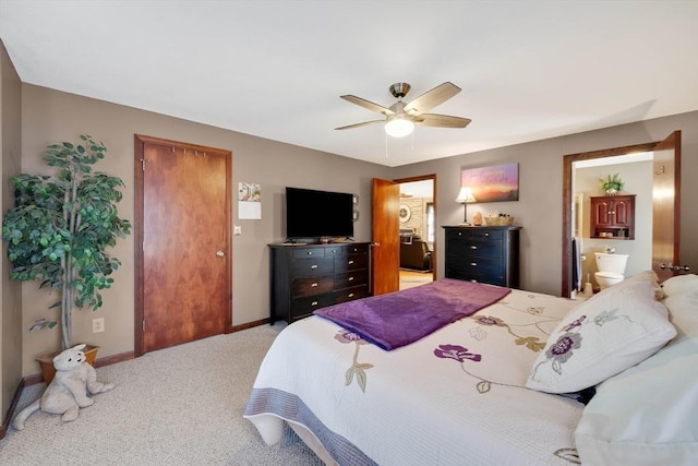 bedroom featuring baseboards, ceiling fan, connected bathroom, and light colored carpet